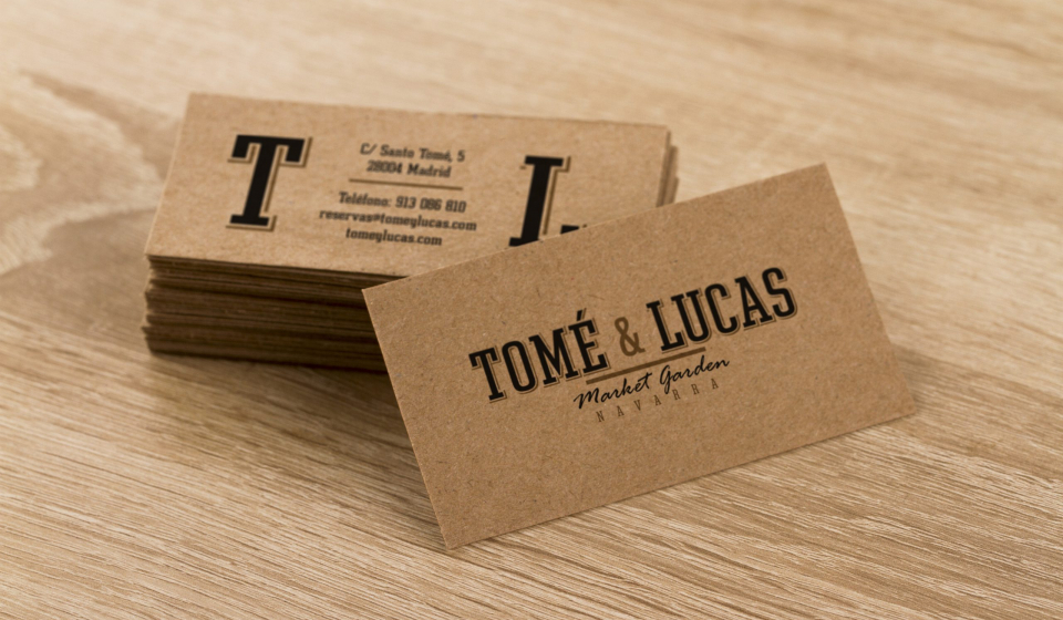 Kraft business cards on a wooden background